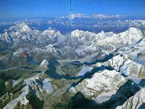 
Leo Dickenson and Chris Dewhirst's balloon taking off from Gokyo October 21, 1991. Gauri Shankar and Menlungtse on the left; Shishapangma top middle-right; Cho Oyu on the right. - Ballooning Over Everest book 
